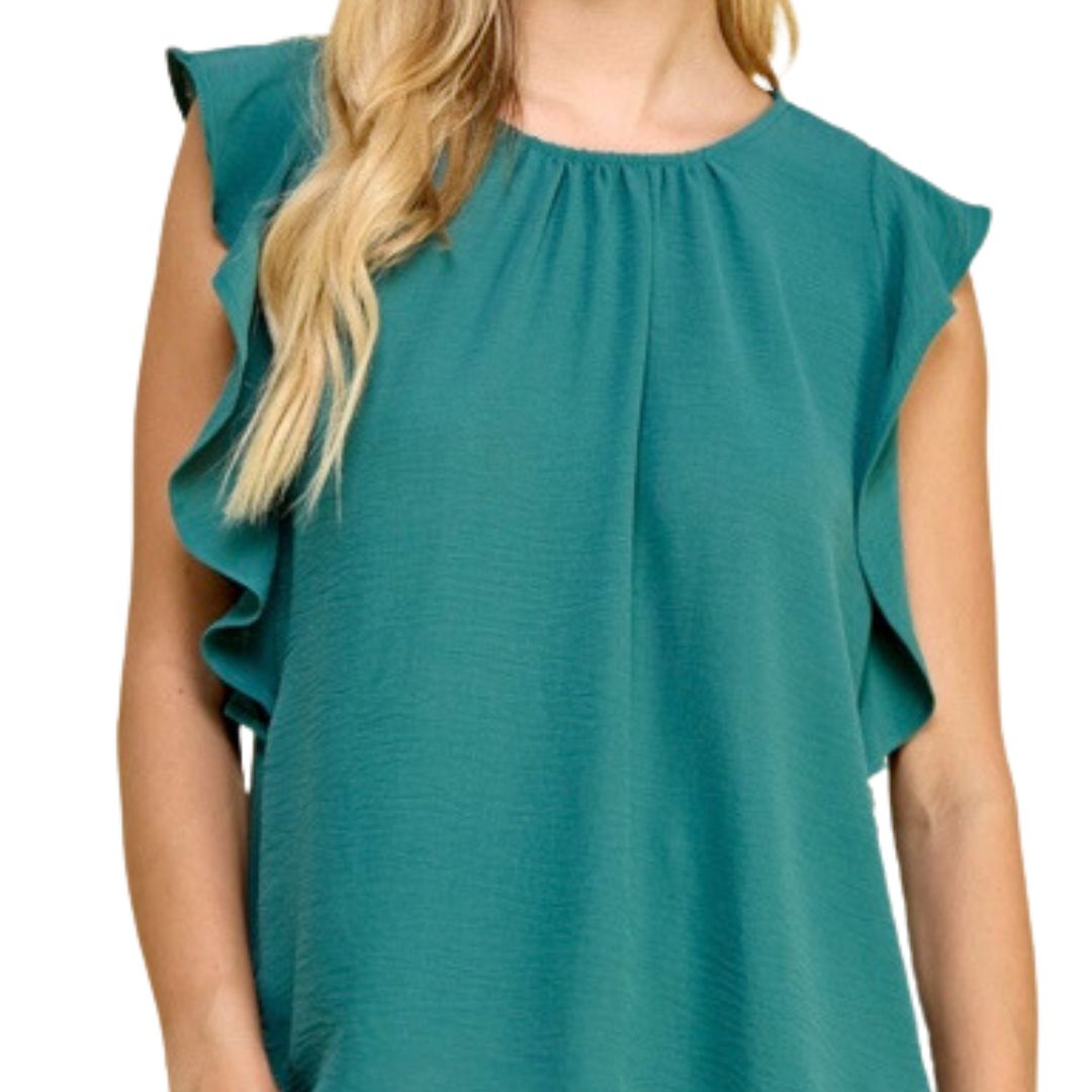 Model in New Teal Ruffle Cut Out Sleeve