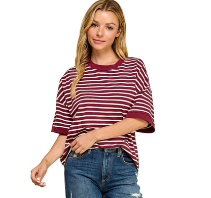 Woman wearing Maroon and White Striped Top 