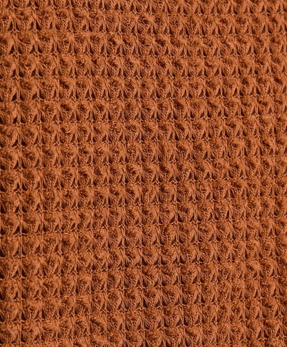 Close-up of brown textured fabric
